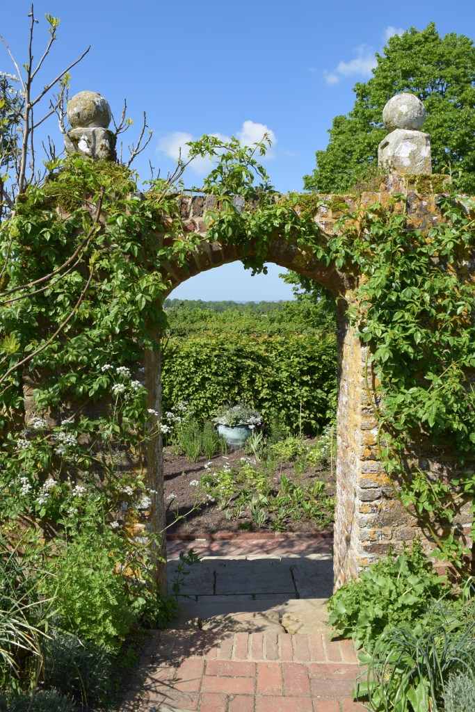 A final view though a weathered arch at Sissinghurst Castle Garden