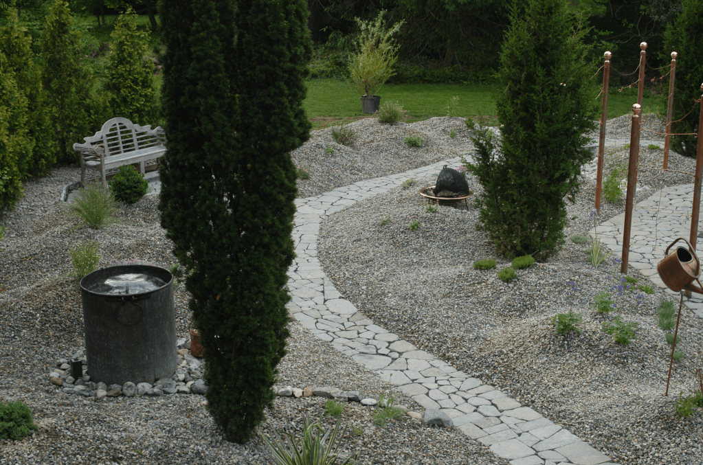 A newly installed garden that is designed with gravel mulch to nver be watered at Northview