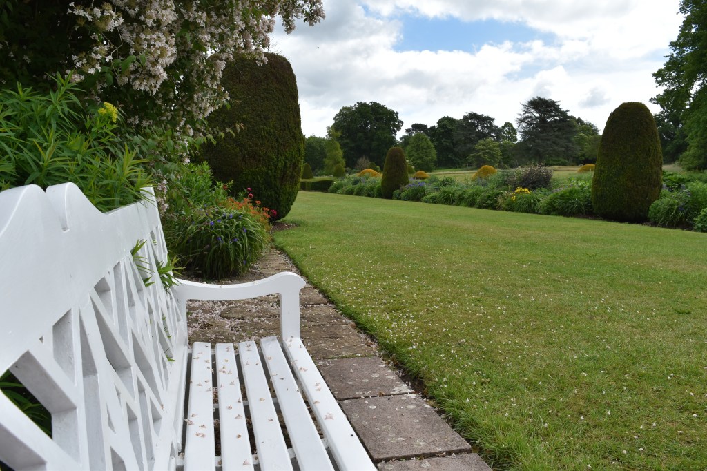 View  from the white bench along the grass path