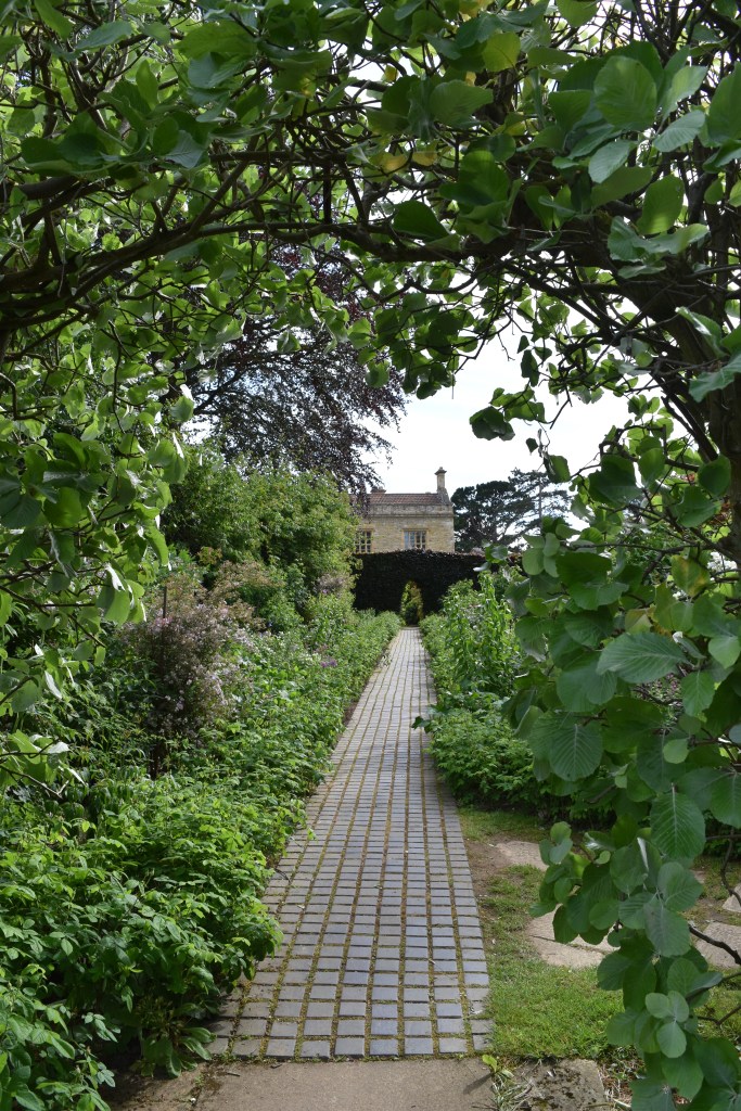 The view back to the house along the Rose Border (Number 5 on the garden map)