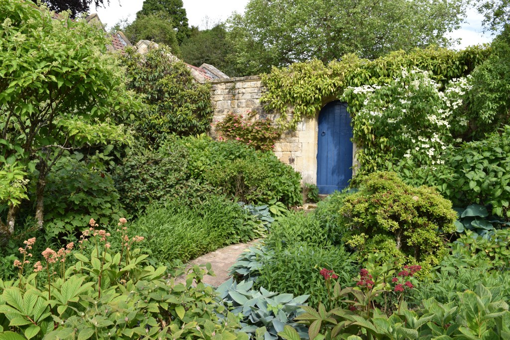 Lovely limestone walls and French blue door